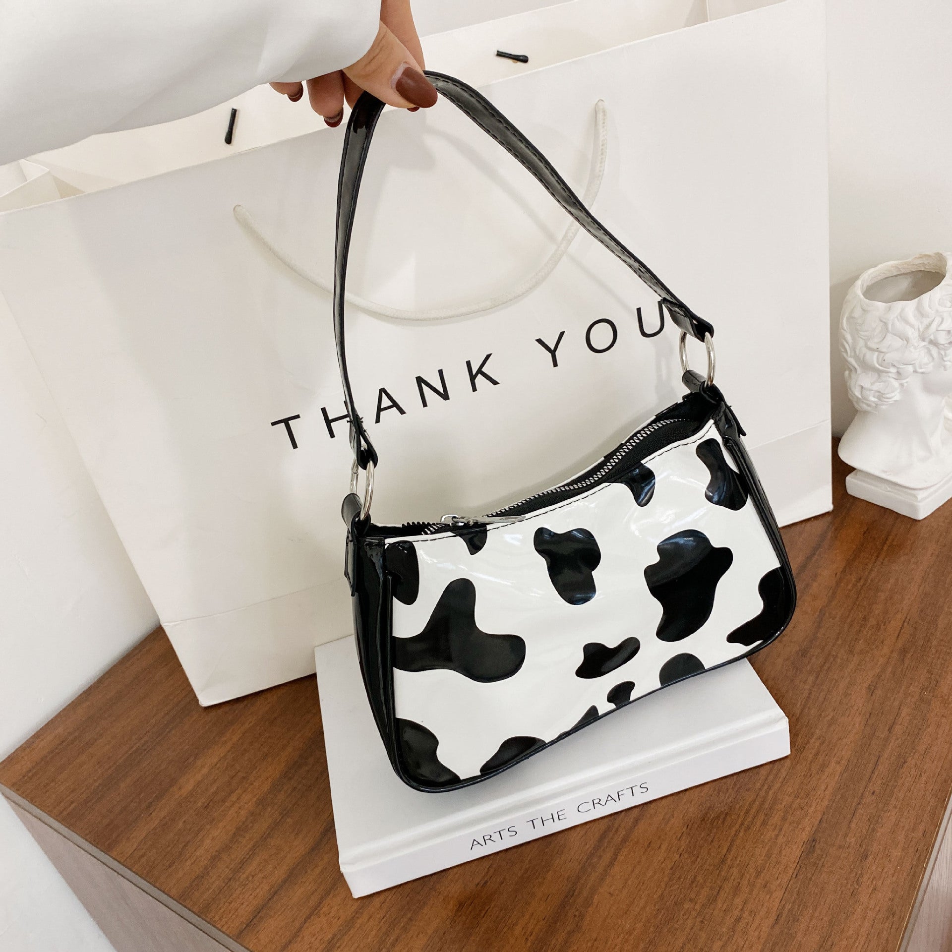 Cow print shoulder on sale bag